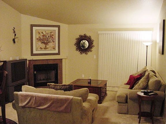 Living Room with Wood Fireplace!!
