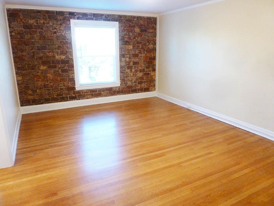 Exposed Brick Walls, Hardwood Floors