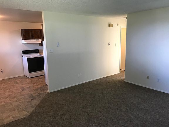 Living room area and hallway to bathroom and bedroom