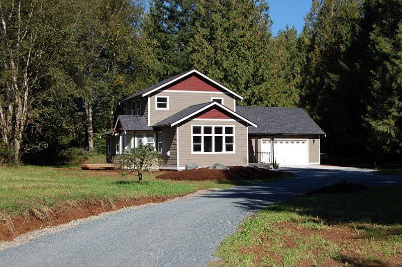 Front View as you approach...1.52 ac lot with south sun exposure