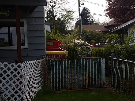 Gate opens to driveway