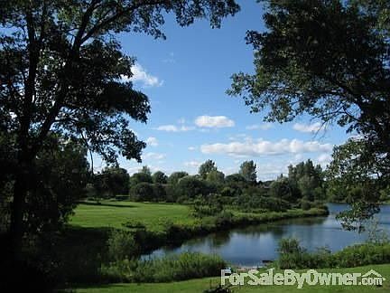 View of Hill Lake from back deck.
						:
						The sights and sounds of nature are in your own back yard.