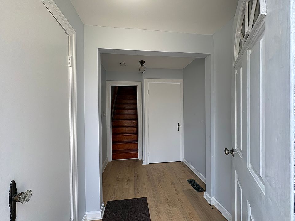 Front entrance, mudroom + laundry.