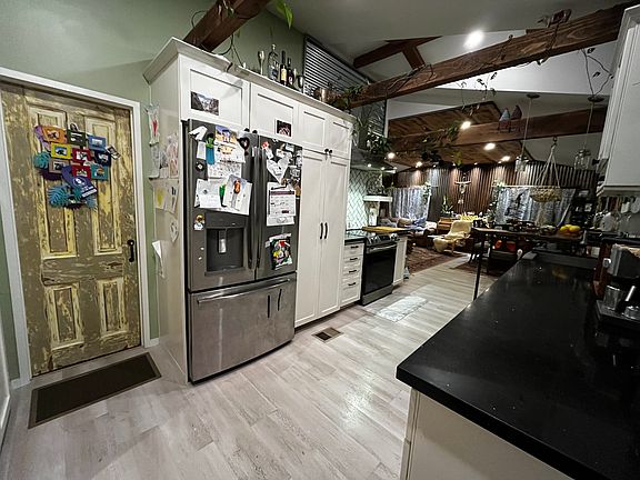 Door to 2nd bedroom, Galley-style Kitchen