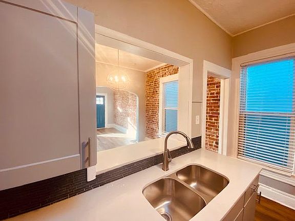 Open Concept Kitchen w/ new quartz countertops and sink