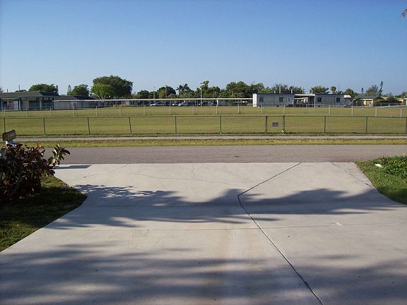 Double Driveway across from rear of school
