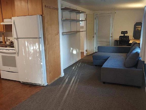 front room (with sofa and desk if furniture is needed)