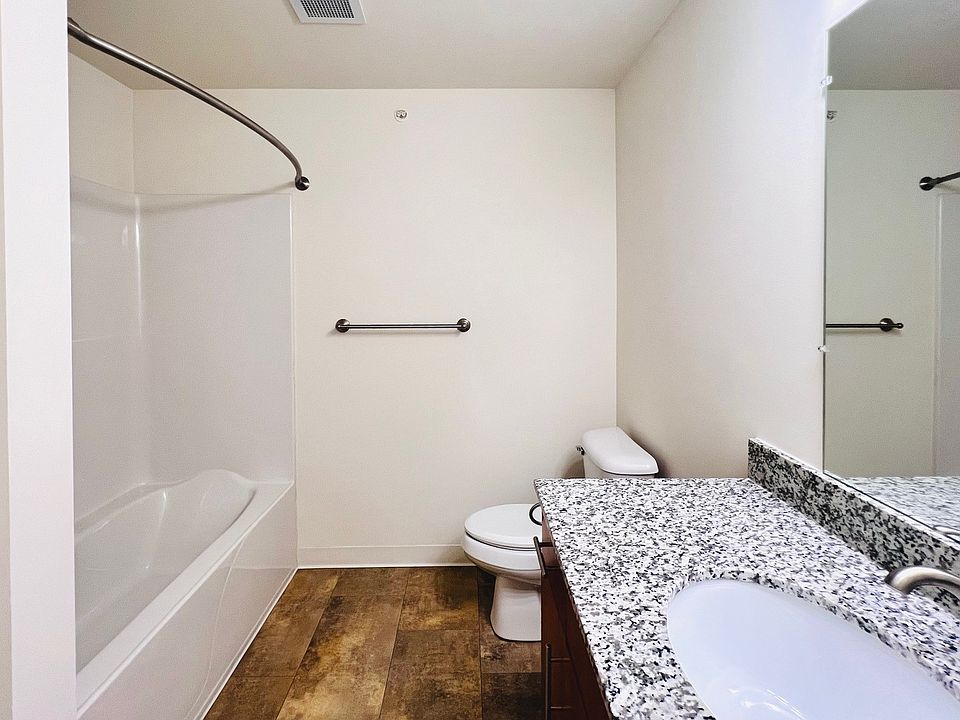 Spacious bathroom with lots of vanity space.