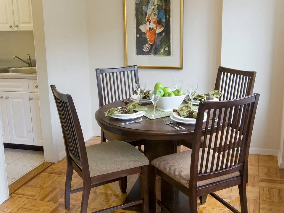 Dining area with parquet flooring