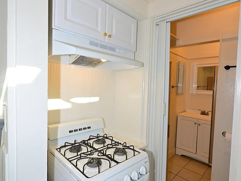 brand new kitchen cabinet and vent hood