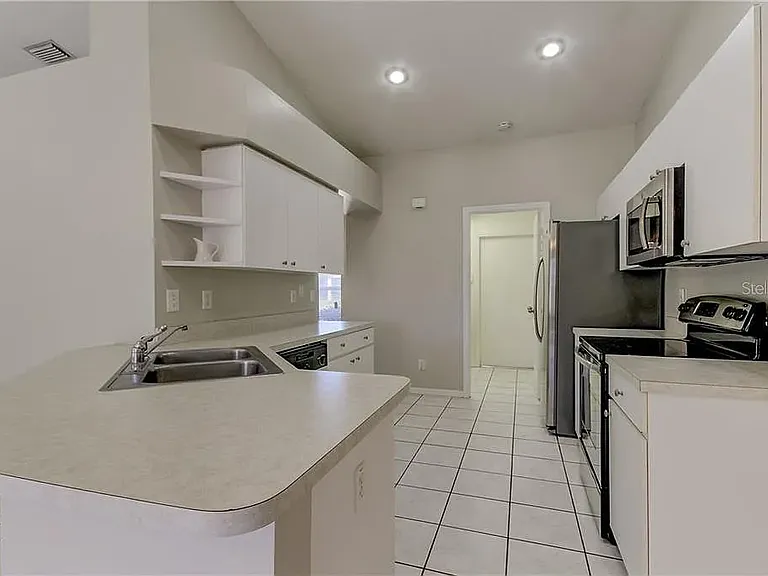 1119 Tuscanny St — Photo 8