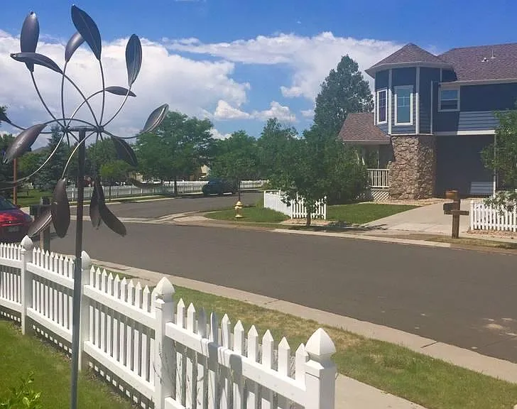Quaint and quiet white picket fence neighborhood within the Broadlands golf course community