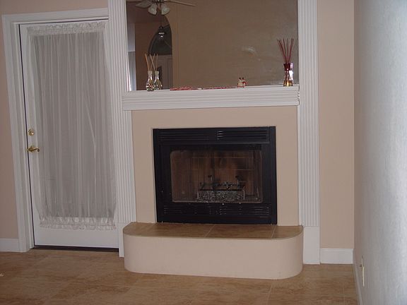 Fire place in family room W/mirror