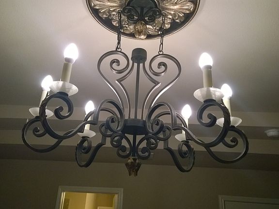 Murray Feiss chandelier in Master Bedroom is black wrought i