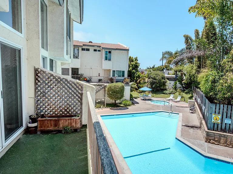 Balcony overlooking the pool and hot tub