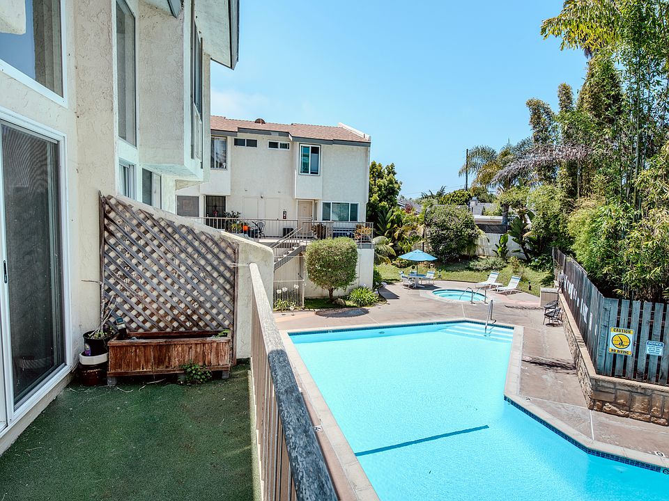 Balcony overlooking the pool and hot tub