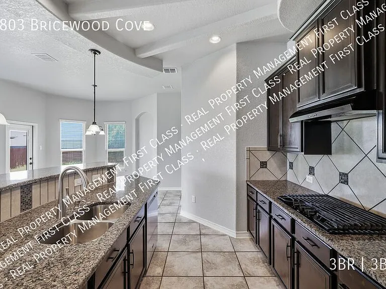 9803 Bricewood Cv — Photo 15