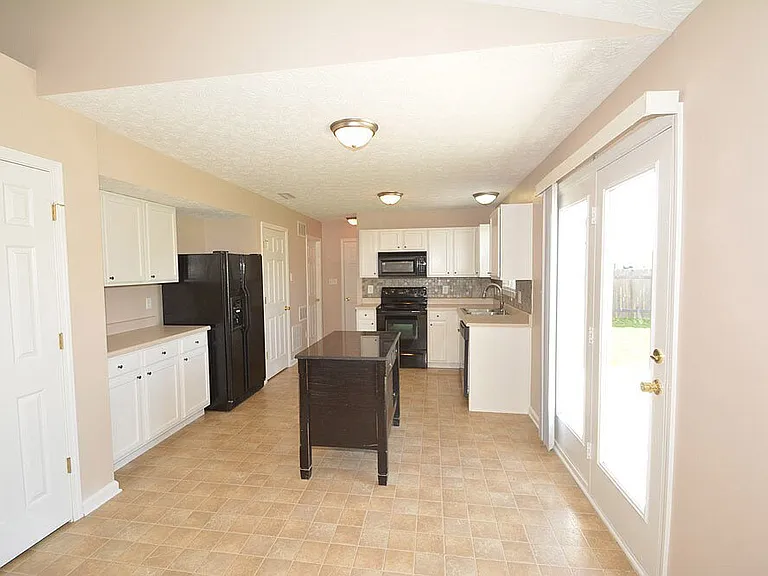 6917 Tree Top Ln — Photo 10
