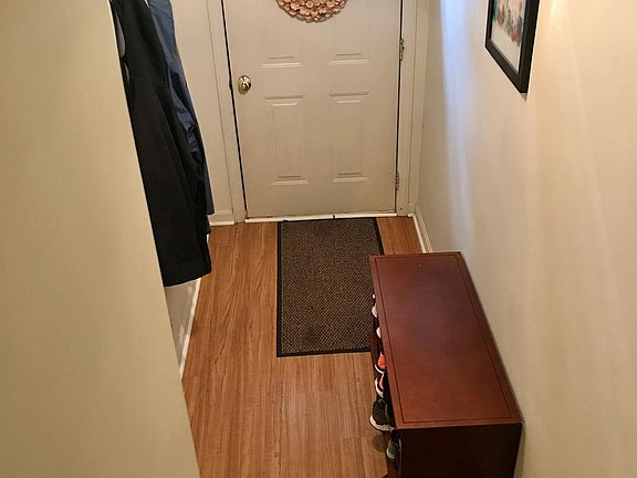 Front entry hallway taken from the stairs that lead to main floor