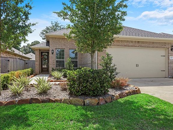 Nestled on Sandbells Park Lane amongst manicured landscaping and friendly neighbors.