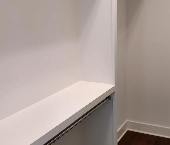 1 of 2 Master bedroom walk in closets