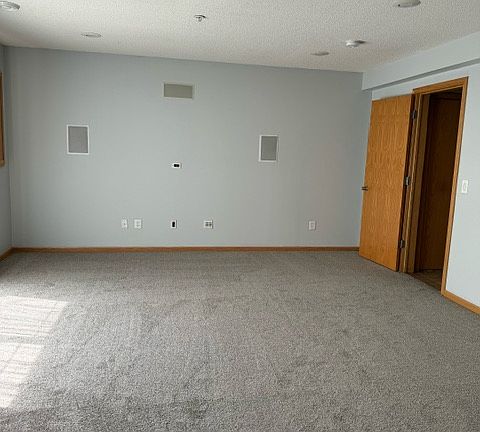 Family Room in lower level with walkout, lower level also has a 3/4 bathroom.