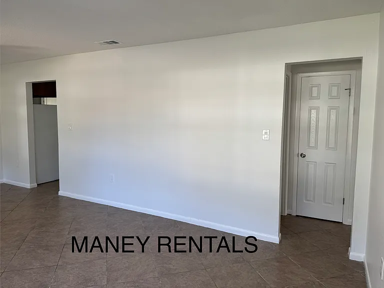 Living/dining doors to kitchen and bed/bath area