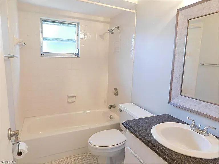 Guest bath comes complete with shower and tub combination.