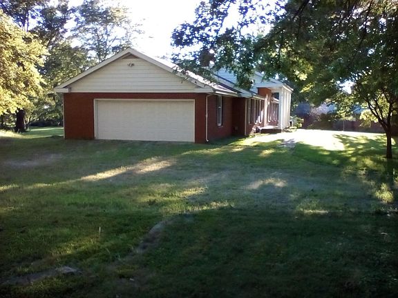 Attached over-sized 2 car garage