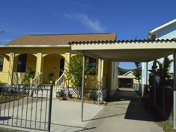 Covered carport & detached garage.