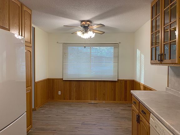 5th image of 6895 Grenwich Ln N