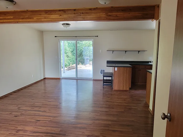 Living room with backyard access.
