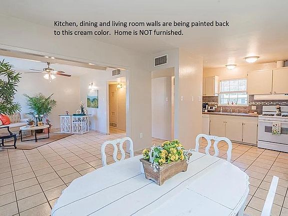 This is an old photo of the home with cream color walls. These rooms are currently light blue and being painted similar to this photo. Home will be rented unfurnished