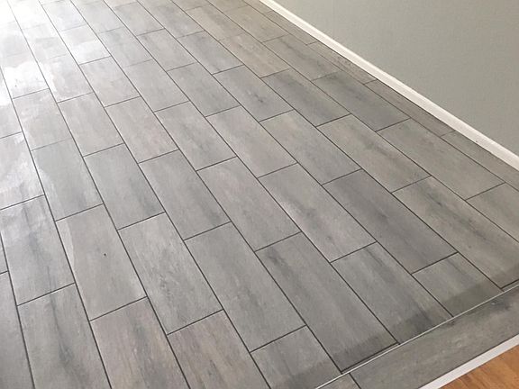 Newly tiled separate living room.
