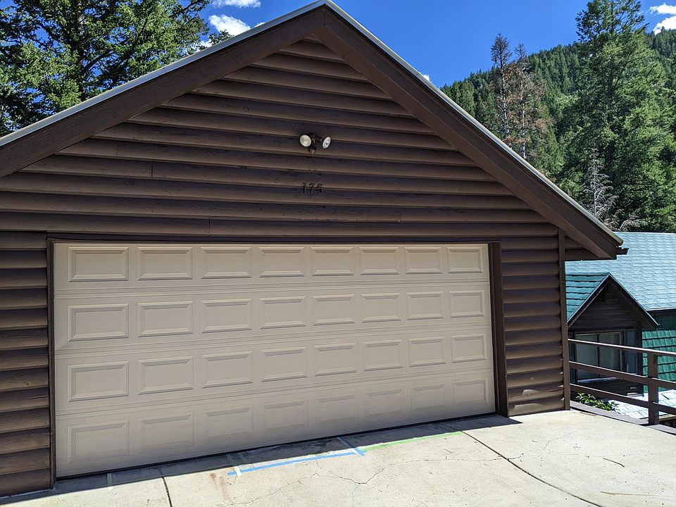 Large 2 car garage, automatic opener & short driveway