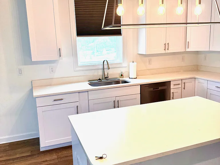 169 Coastal Drive - Kitchen with Quartz Countertops, Large Center Island & Gourmet Kitchen Layout