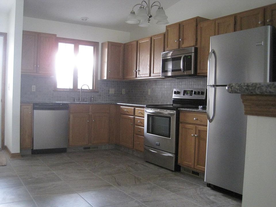 bright kitchen with granite and 18" tile