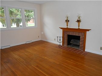 Living Room With Wood Burning Fire Place