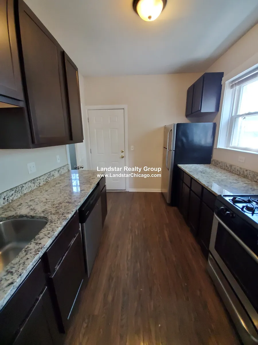 Building Photo - 4451 N Hamlin Ave #2