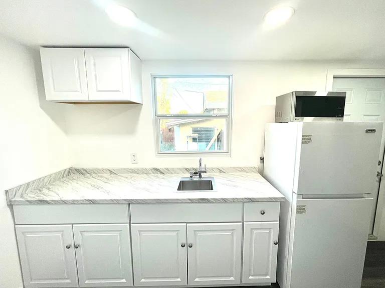 57 NW 48th Pl #5 — Photo 14