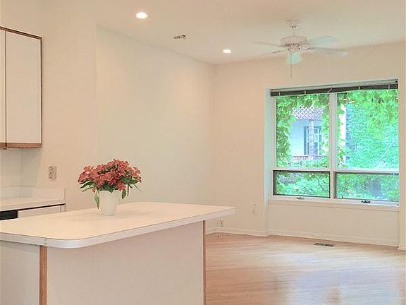 open concept main-floor with kitchen/living/dining space