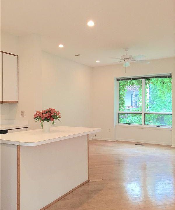 open concept main-floor with kitchen/living/dining space