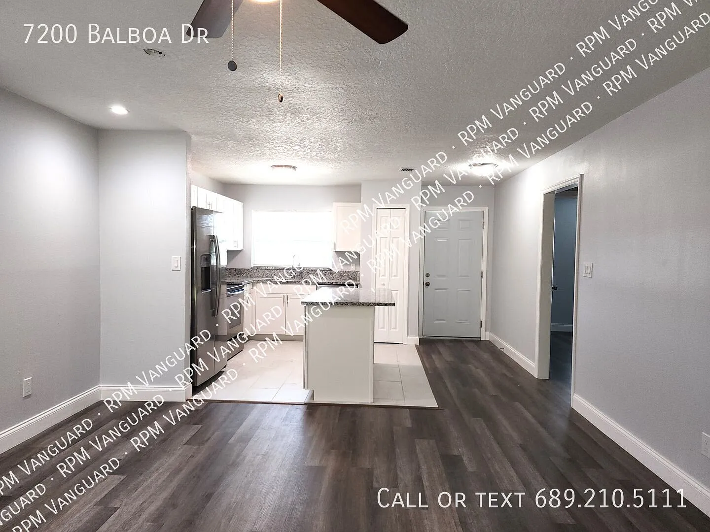 Ground Floor End Unit Condo with Open Floor Plan and Screened Patio; Water Included — Photo 4