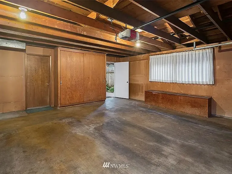 Two car garage with ample storage space.
