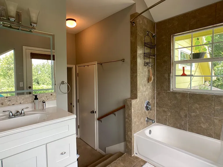 door in background to toilet