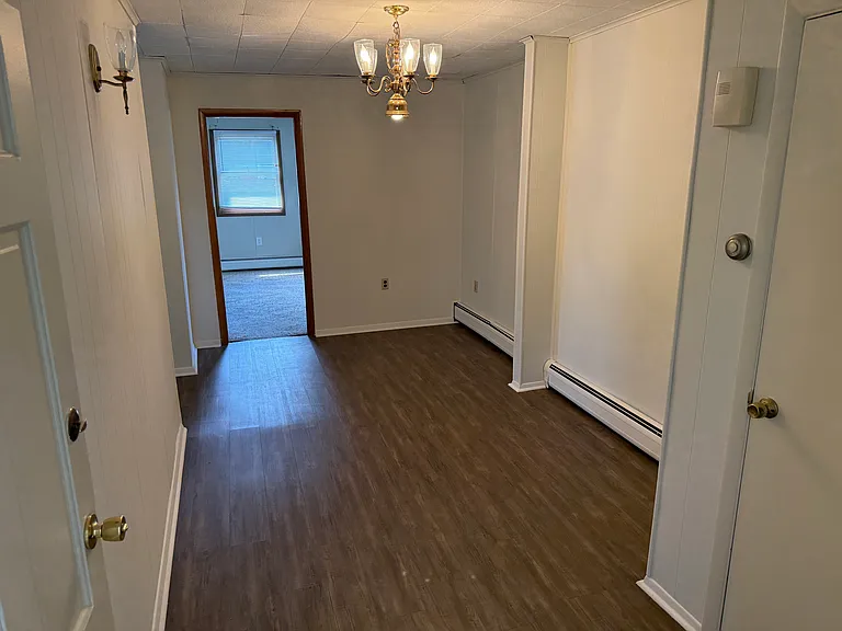 dining room, shows entrance to main bedroom