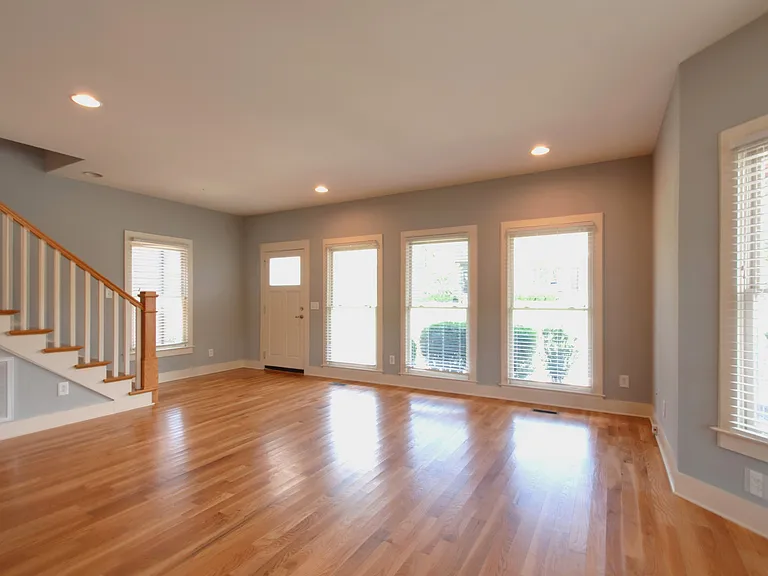 The living space is drenched in natural light
