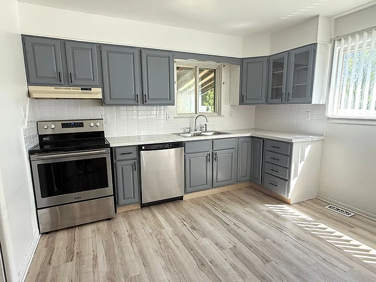 7457 Harrison St — Photo 11