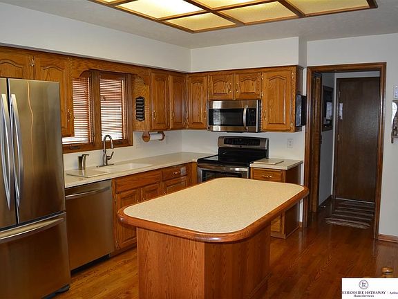 Stainless appliances, center island & corion counters