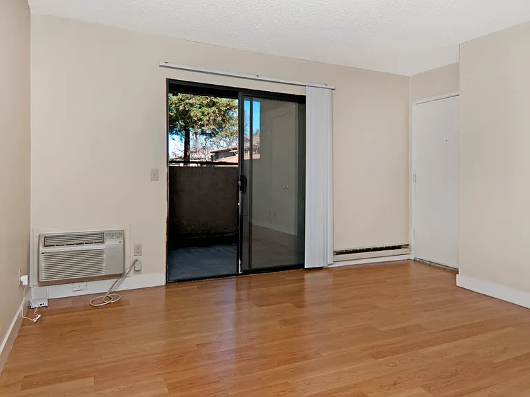 Living Room with Hard Surface Flooring and Balcony